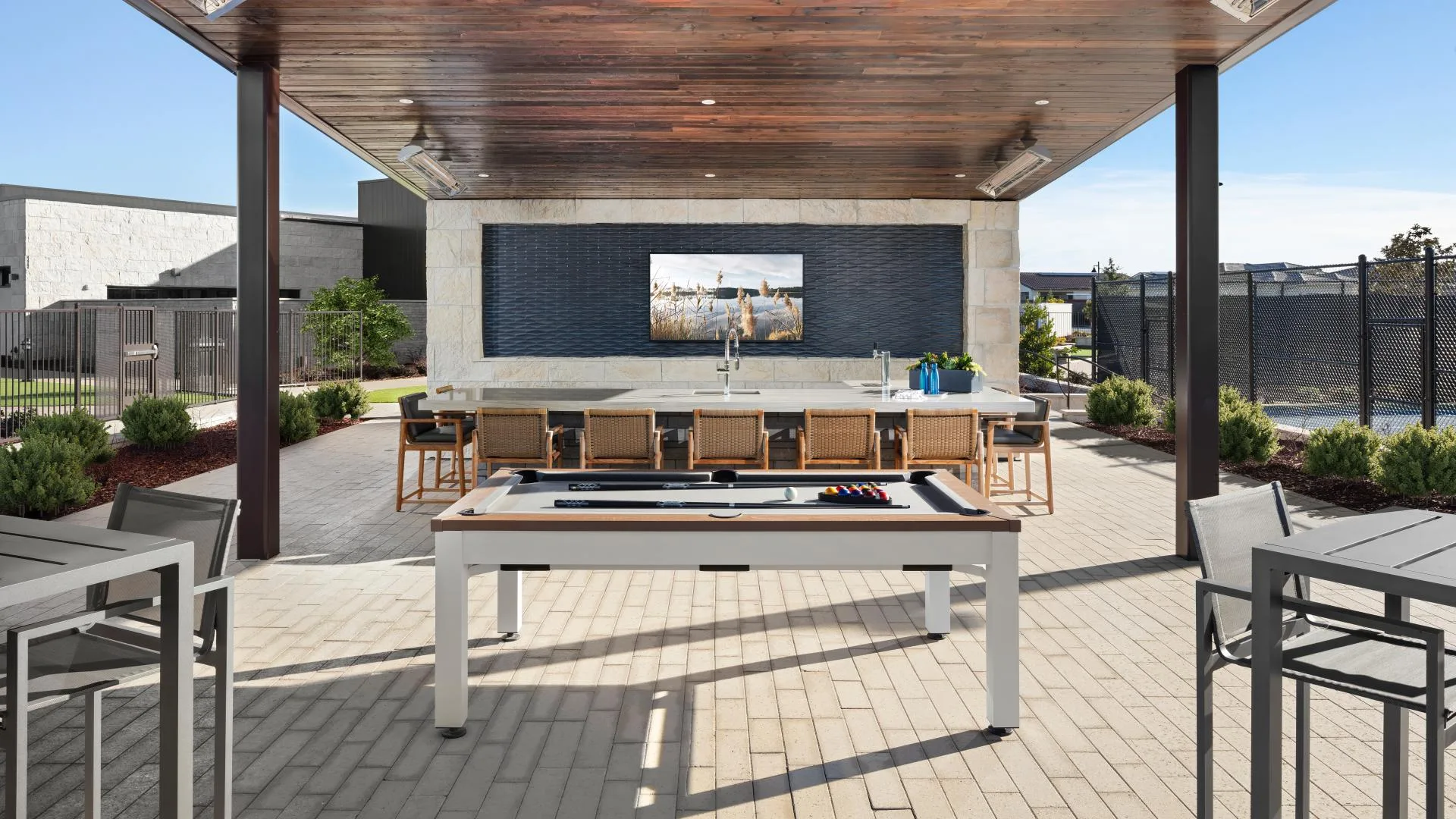 Covered outdoor lounge and patio at Regency at Folsom Ranch in Folsom, California, an amenity buyers weigh as they compare resale homes