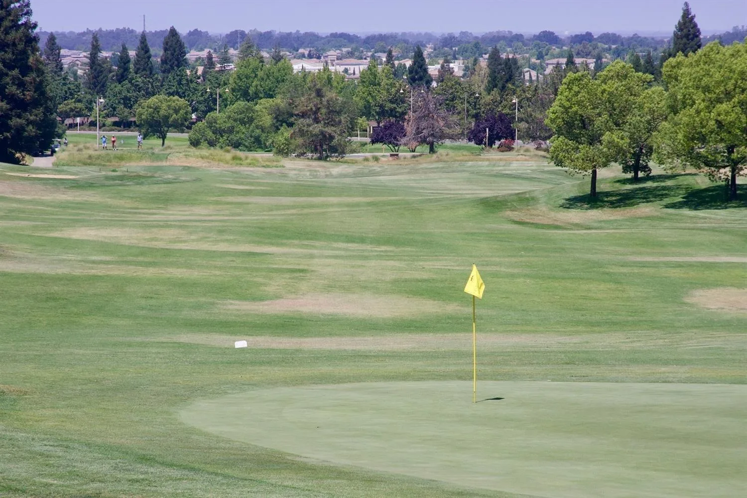 Golf course fairway and putting green at Sun City Lincoln Hills in Lincoln, California