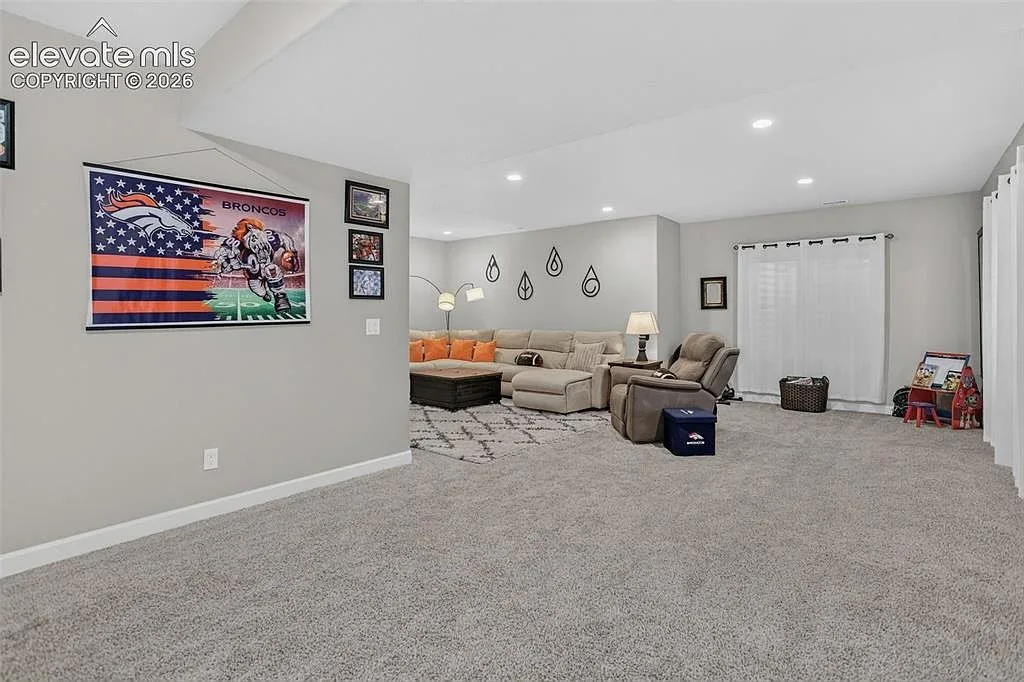 Large finished basement recreation room at 10988 Tarbell Dr