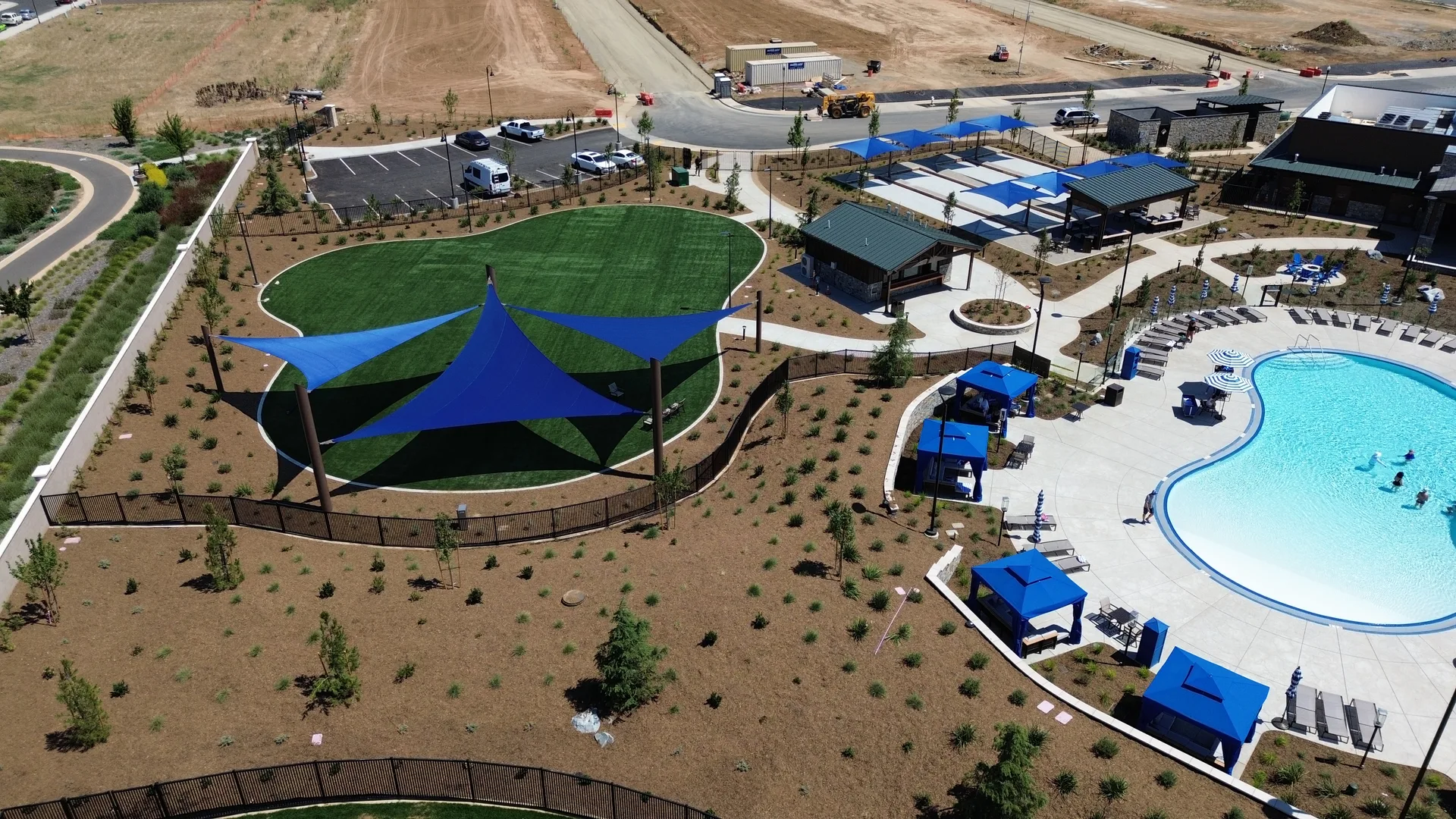 Aerial view of the amenities at Esplanade at Madeira Ranch in Elk Grove, California, with the Lodge clubhouse and grounds.