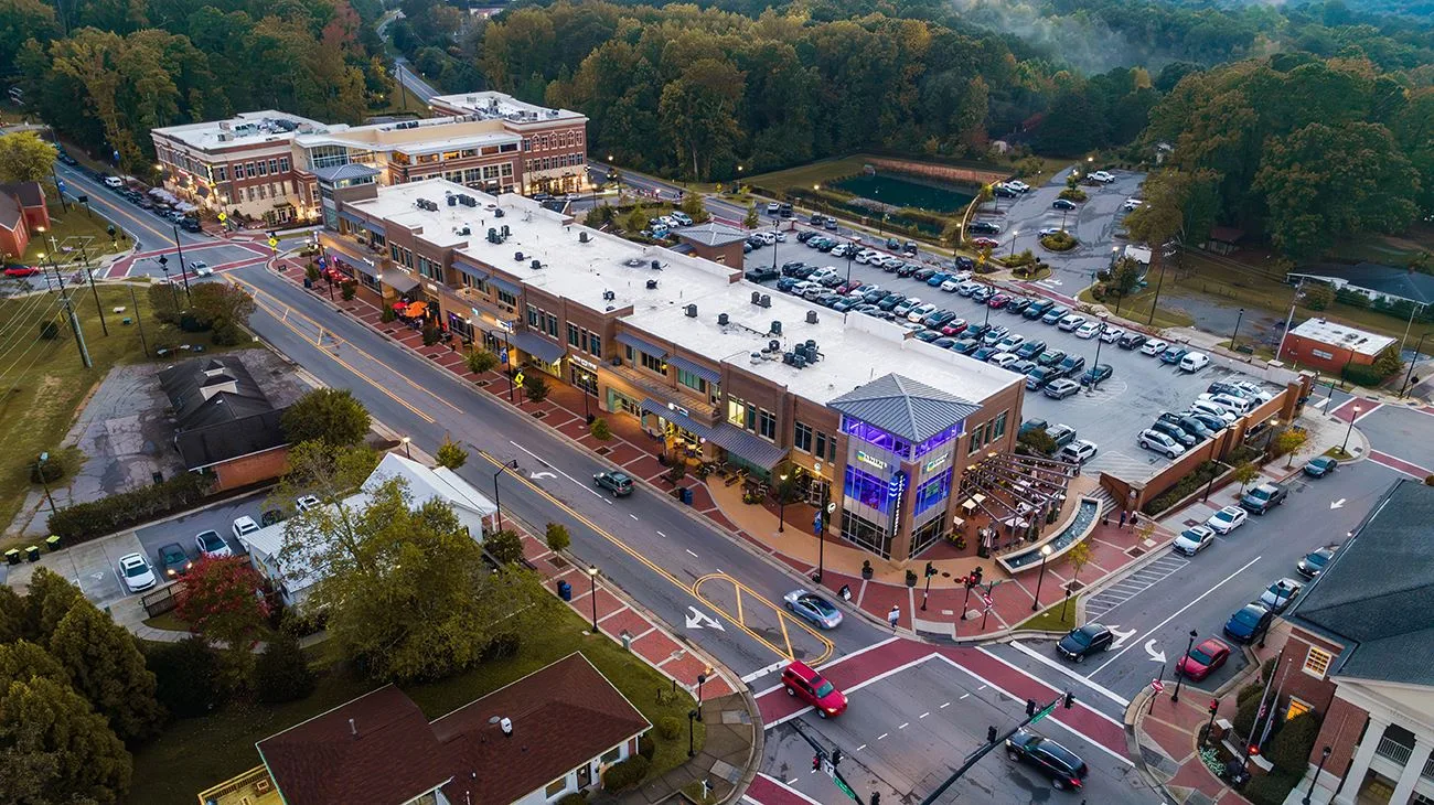 Aerial view of a commercial shopping plaza near Brightleaf at The Park, Durham