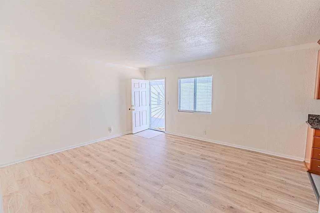 Living room and front entry at 1085 12th St Unit F