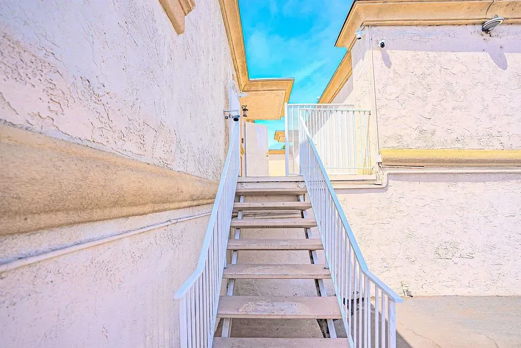 Outdoor staircase to the building at 1085 12th St Unit F