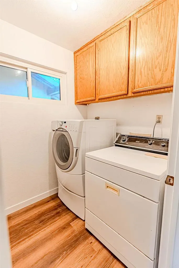 Laundry room with cabinets at 637 Redlands Pl