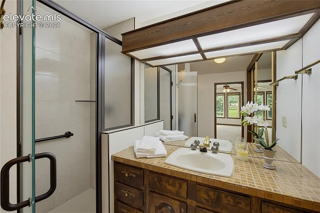 Bathroom vanity with a tiled countertop