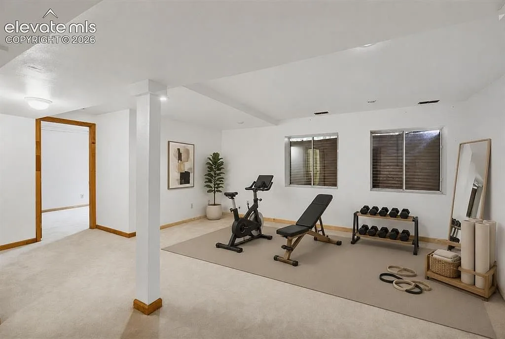 Basement room set up as a home gym