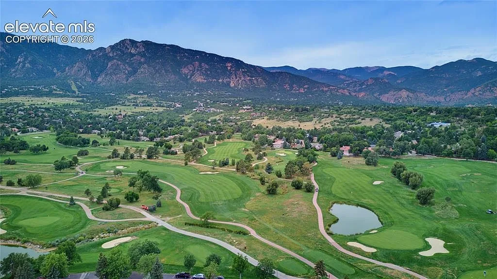 Golf fairway with the Cheyenne Mountains in the distance