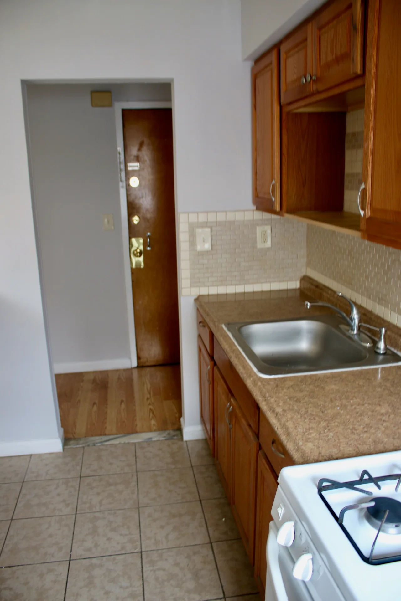 Kitchen and entry view of the 59 Broadway apartment