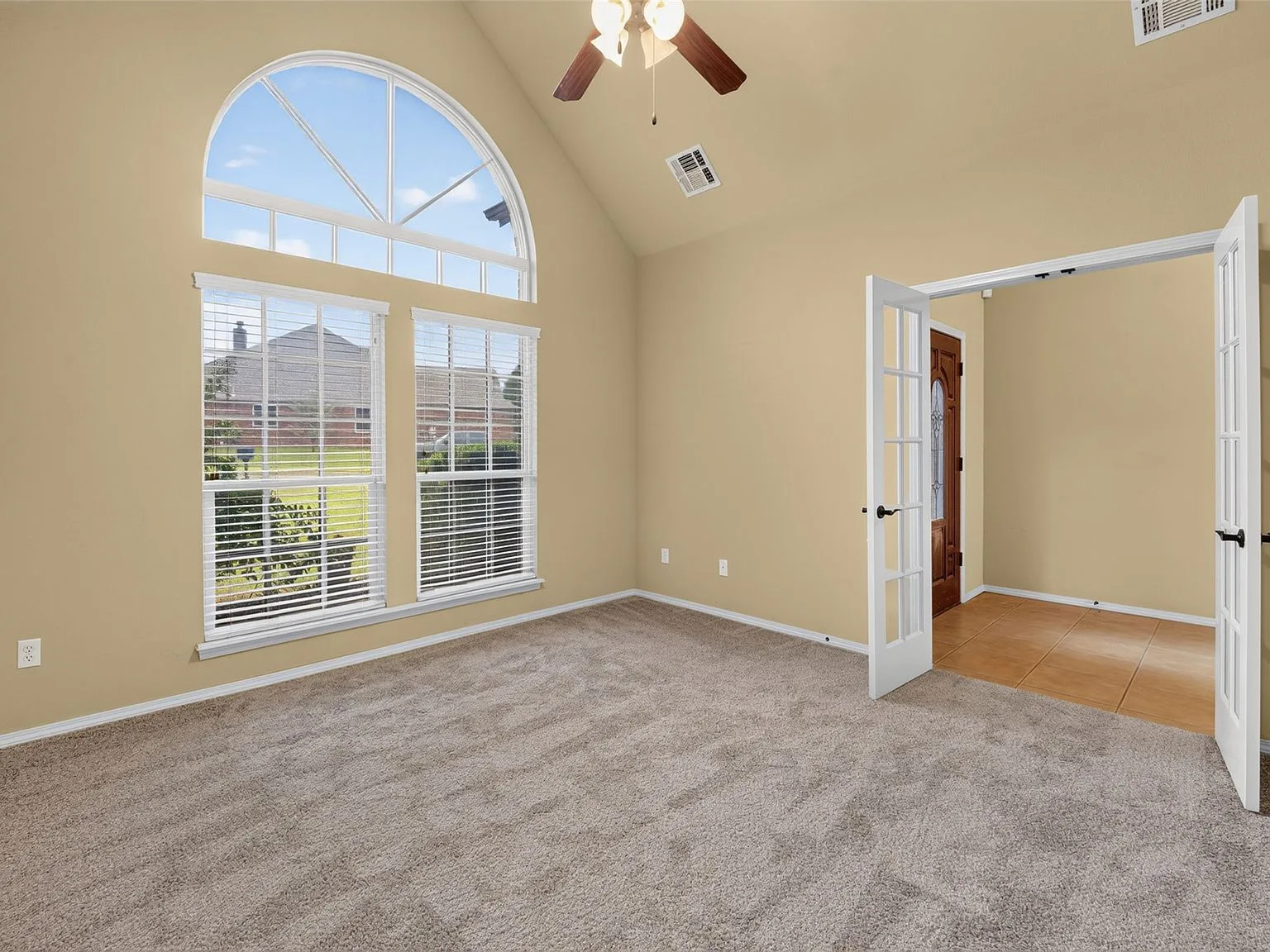 Flex room with French doors, ideal for a home office