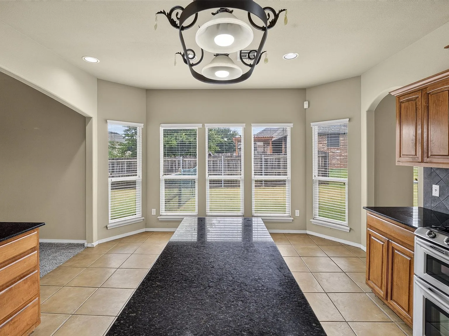 Breakfast nook with granite-topped island