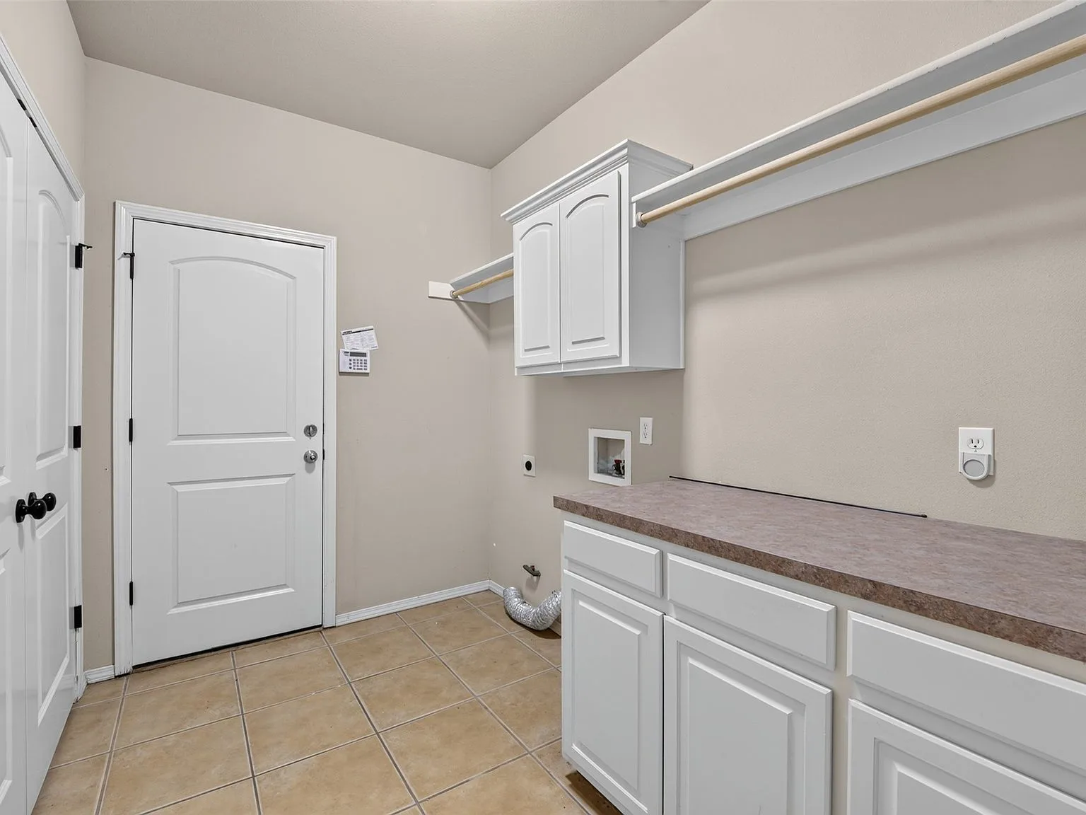 Laundry room with cabinetry