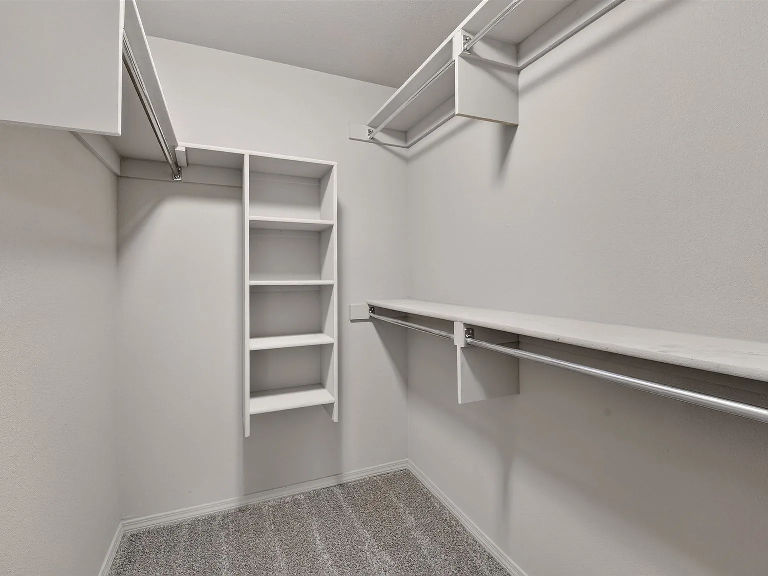 Walk-in closet at 4604 N Narcissus Ave with shelving and hanging space