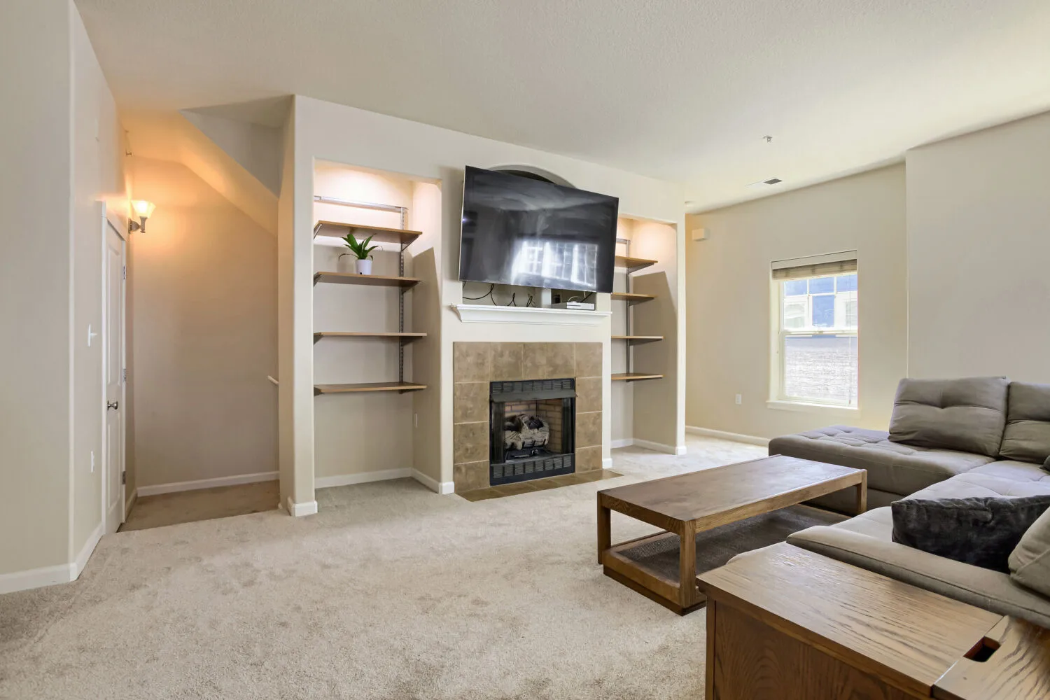 Living room with fireplace at athe townhouse at 22862 SW Forest Creek Dr #203, Sherwood, OR