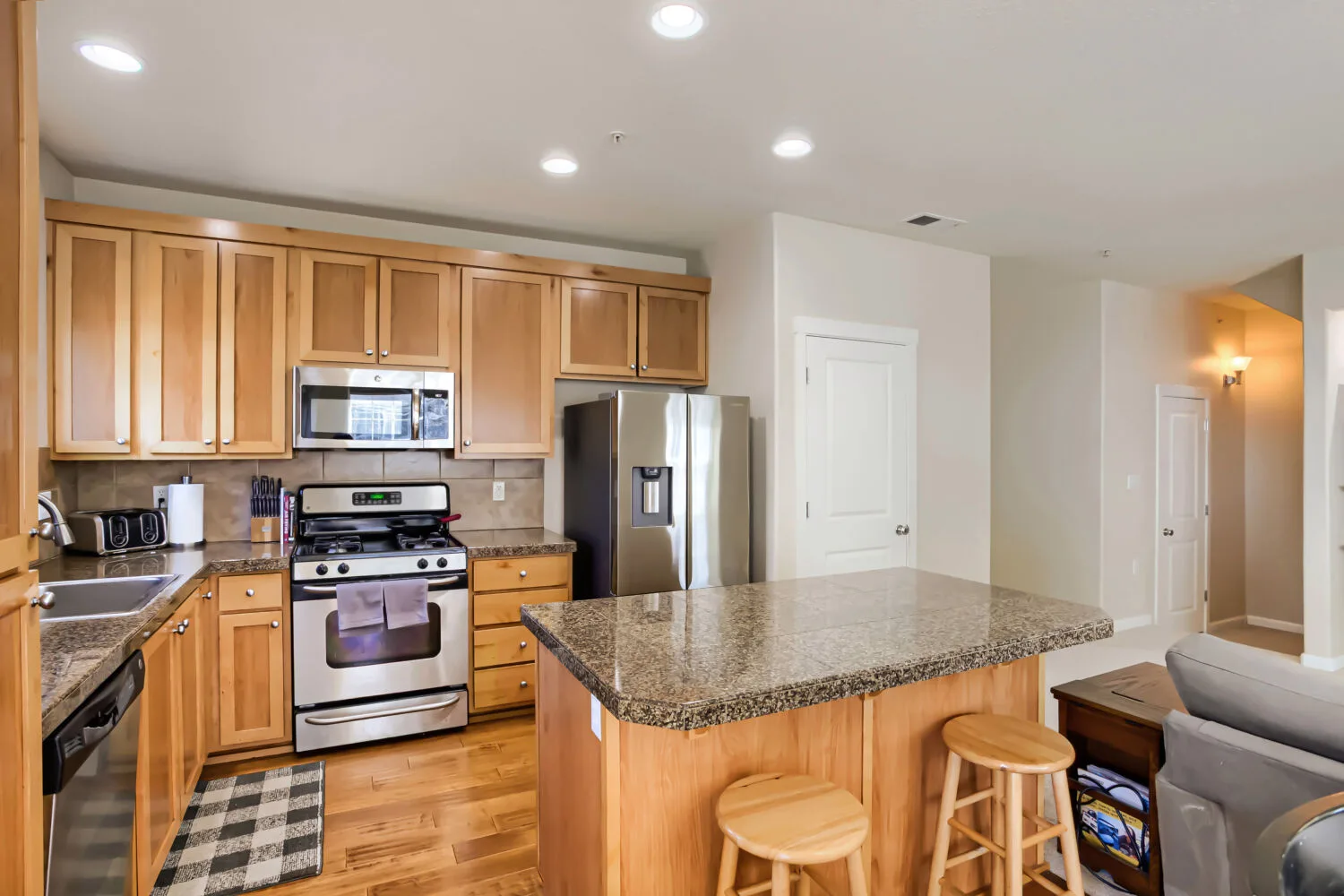 Kitchen with light wood cabinets at athe townhouse at 22862 SW Forest Creek Dr #203, Sherwood, OR