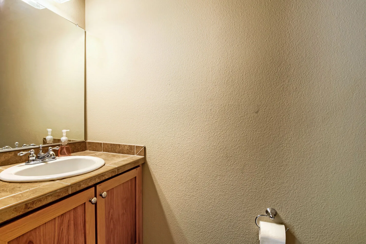 Bathroom vanity with wood cabinetry at athe townhouse at 22862 SW Forest Creek Dr #203, Sherwood, OR
