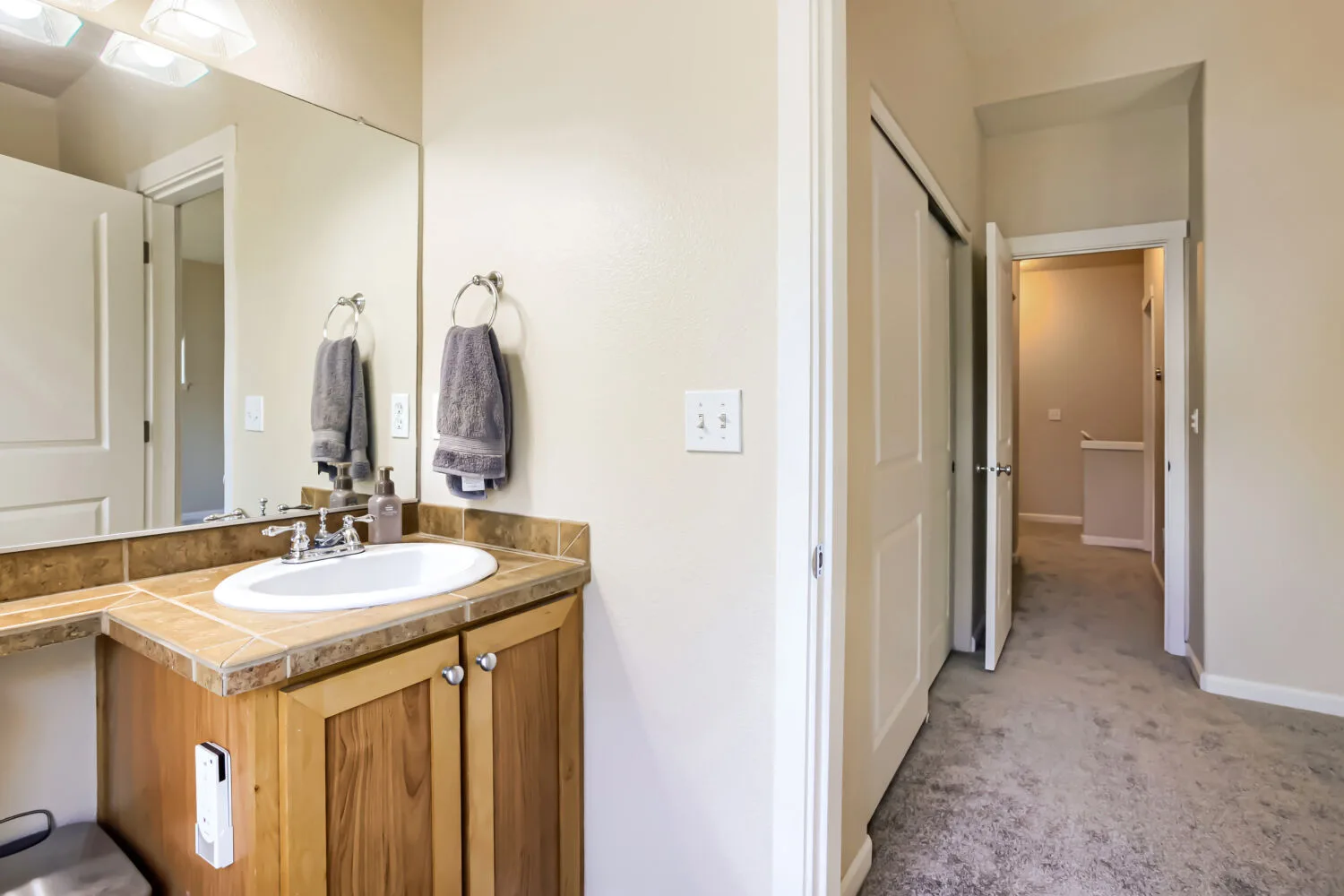 Bathroom vanity often the hallway at athe townhouse at 22862 SW Forest Creek Dr #203, Sherwood, OR