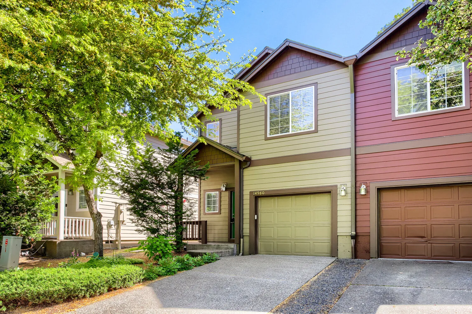 Second exterior facade view of the attached townhome at 14980 SW Conor Cir, Beaverton, OR