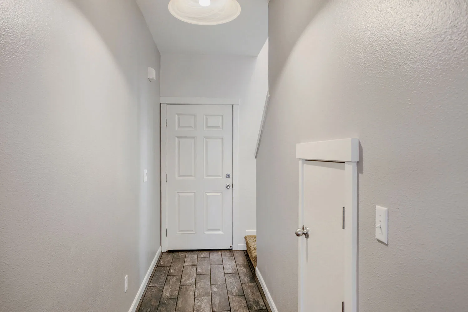Entryway and front door of the townhome at 14980 SW Conor Cir, Beaverton, OR