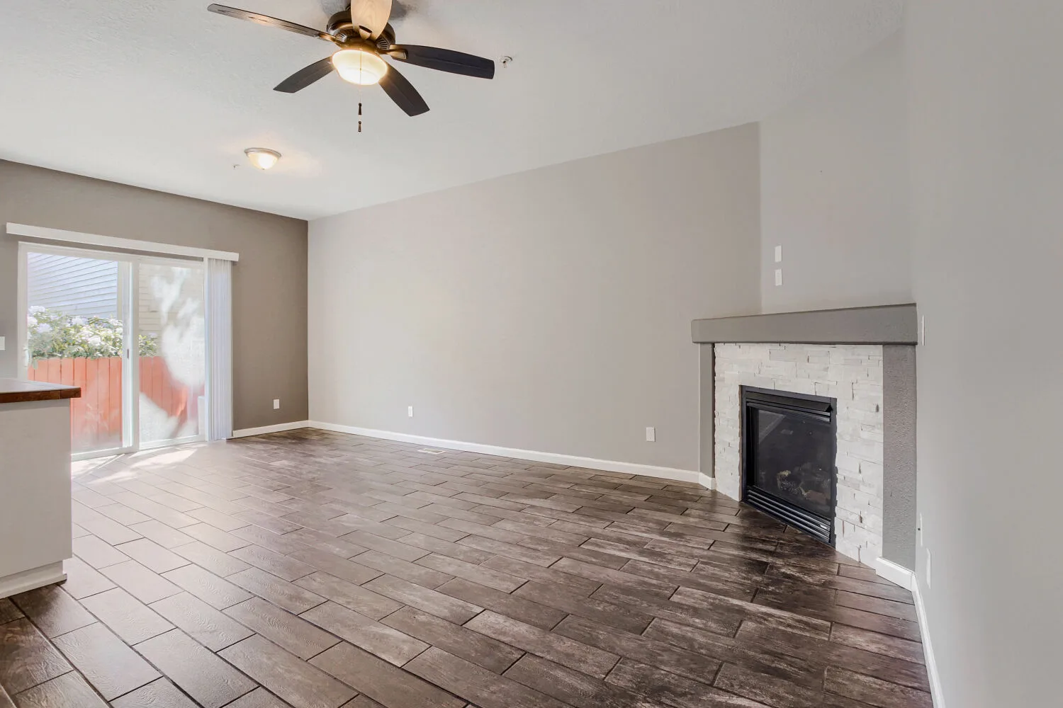 Living room with fireplace at the townhome at 14980 SW Conor Cir, Beaverton, OR