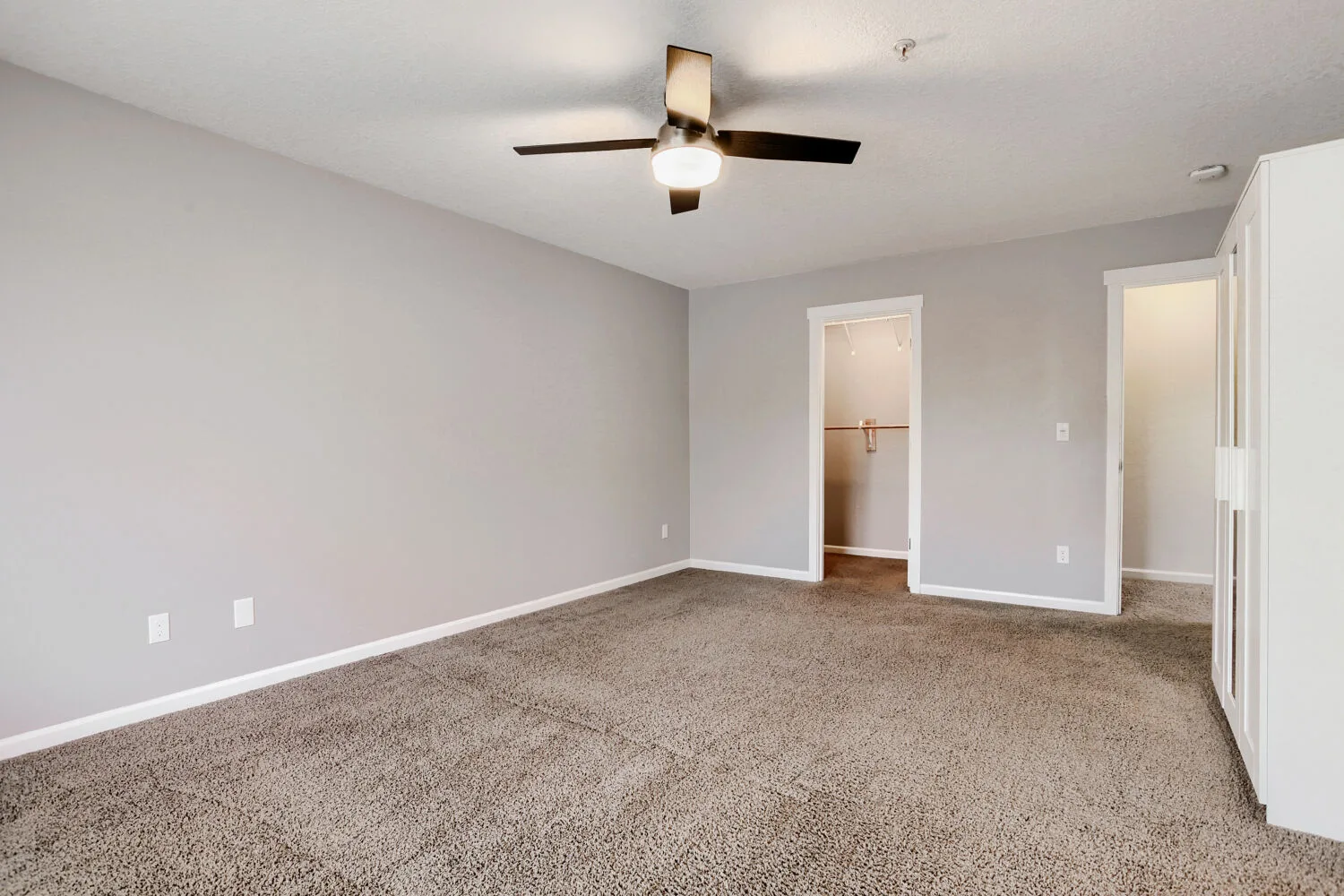 Spacious neutral bedroom at the townhome at 14980 SW Conor Cir, Beaverton, OR