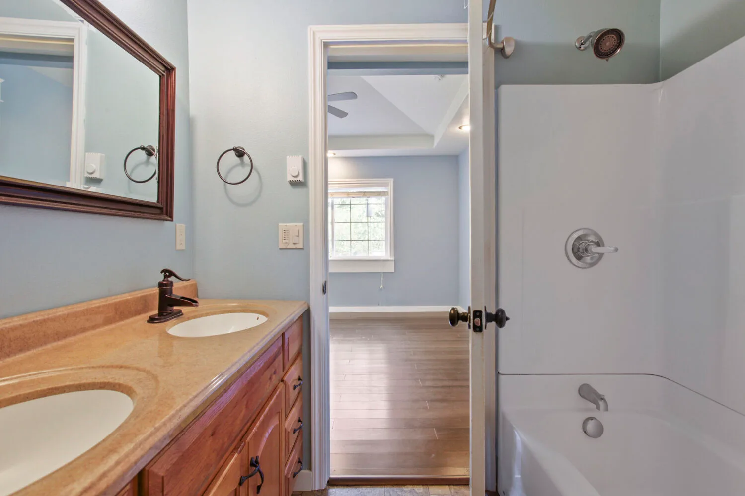 Second bathroom with dual vanity at 6314 SE Jennings Ave, Milwaukie, OR