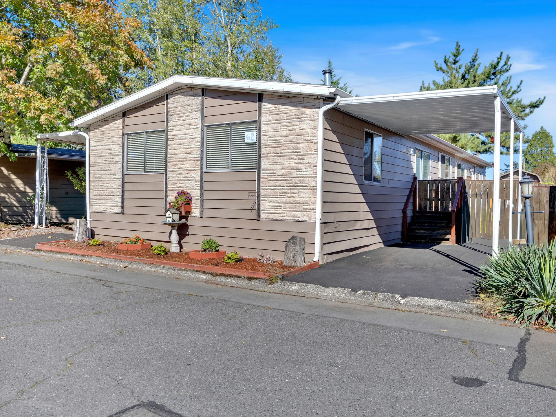 Street-level facade with carport at 21100 NE Sandy Blvd #62, Fairview, OR