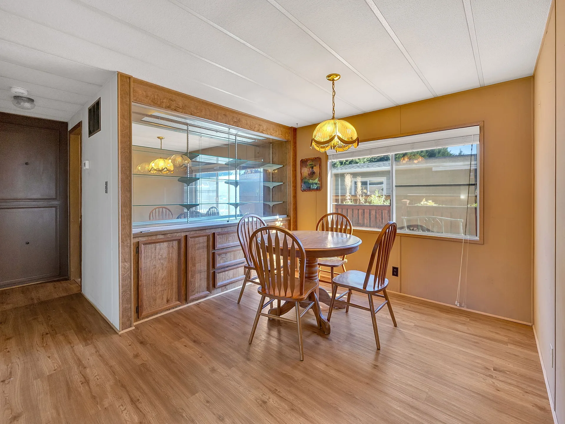 Dining area with built-in hutch at 21100 NE Sandy Blvd #62, Fairview, OR