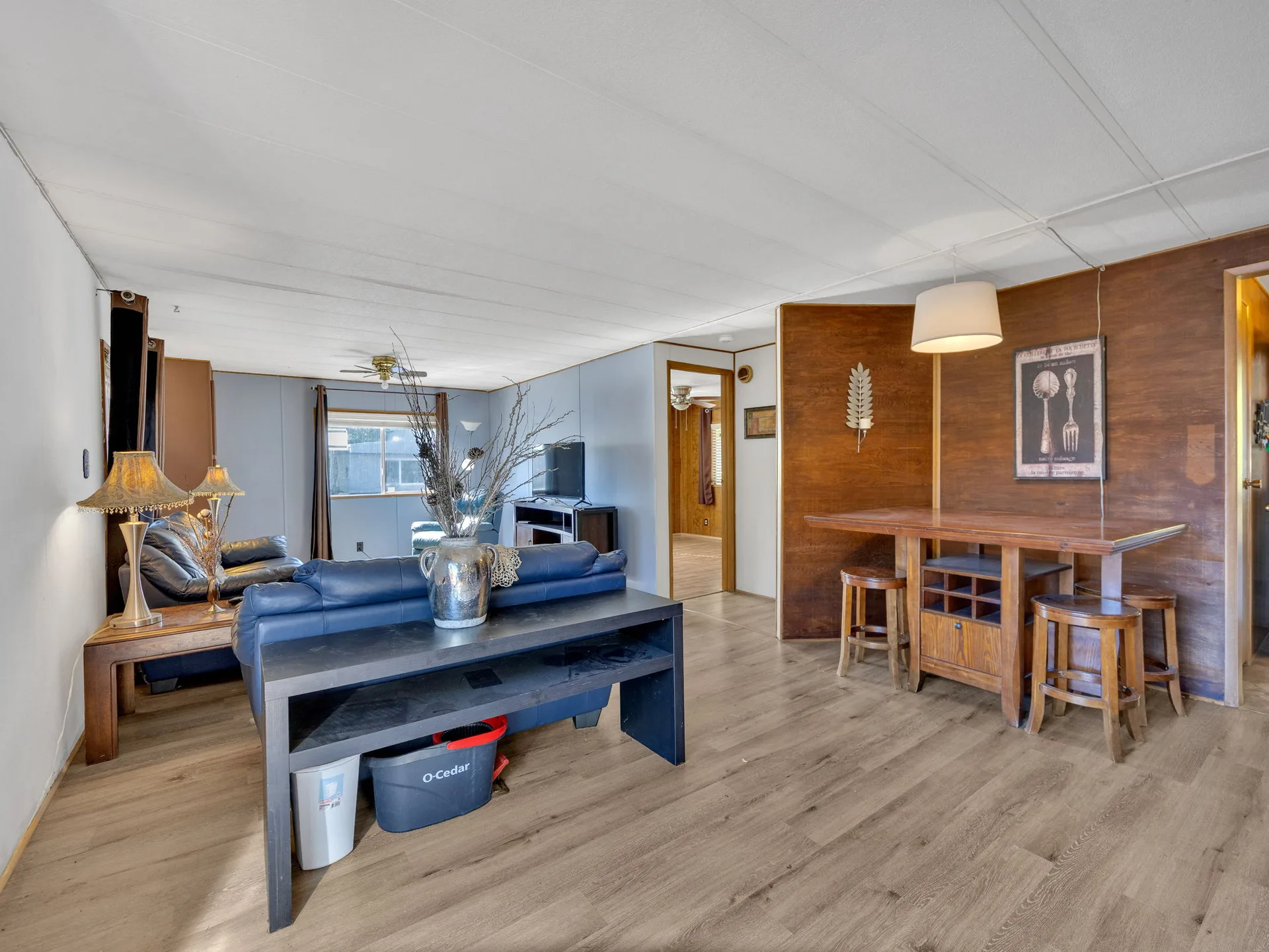 Combined living and dining area at 21100 NE Sandy Blvd #62, Fairview, OR