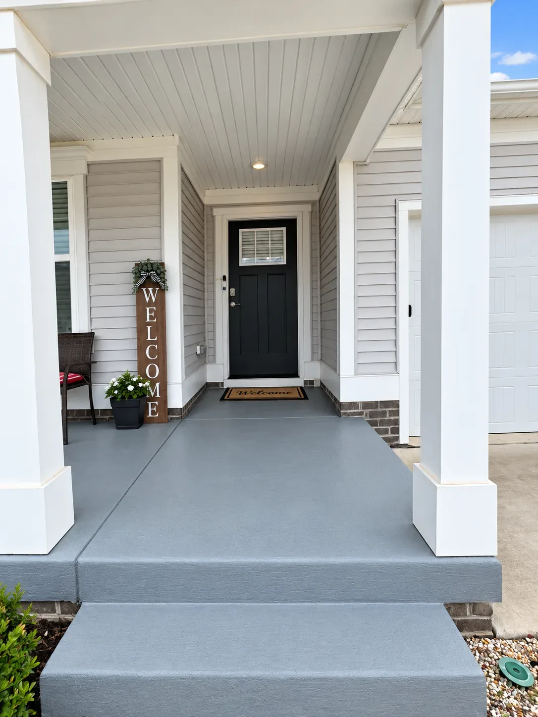 Covered front porch and entry at 6620 Sterling Way in Ladysmith Village