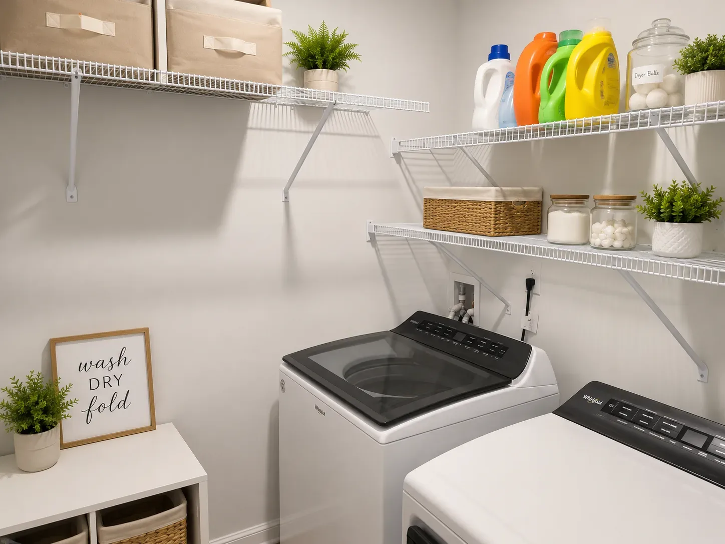 Laundry room with shelving and storage space in Ladysmith Village