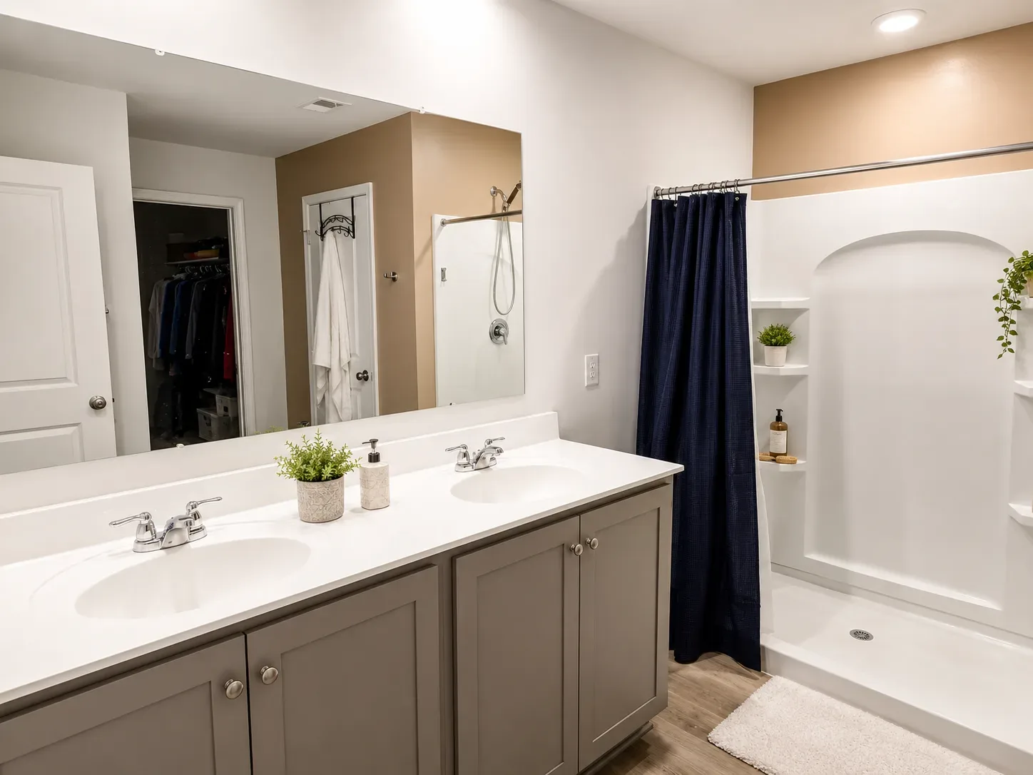 Bathroom with double vanity and walk-in shower in Ruther Glen