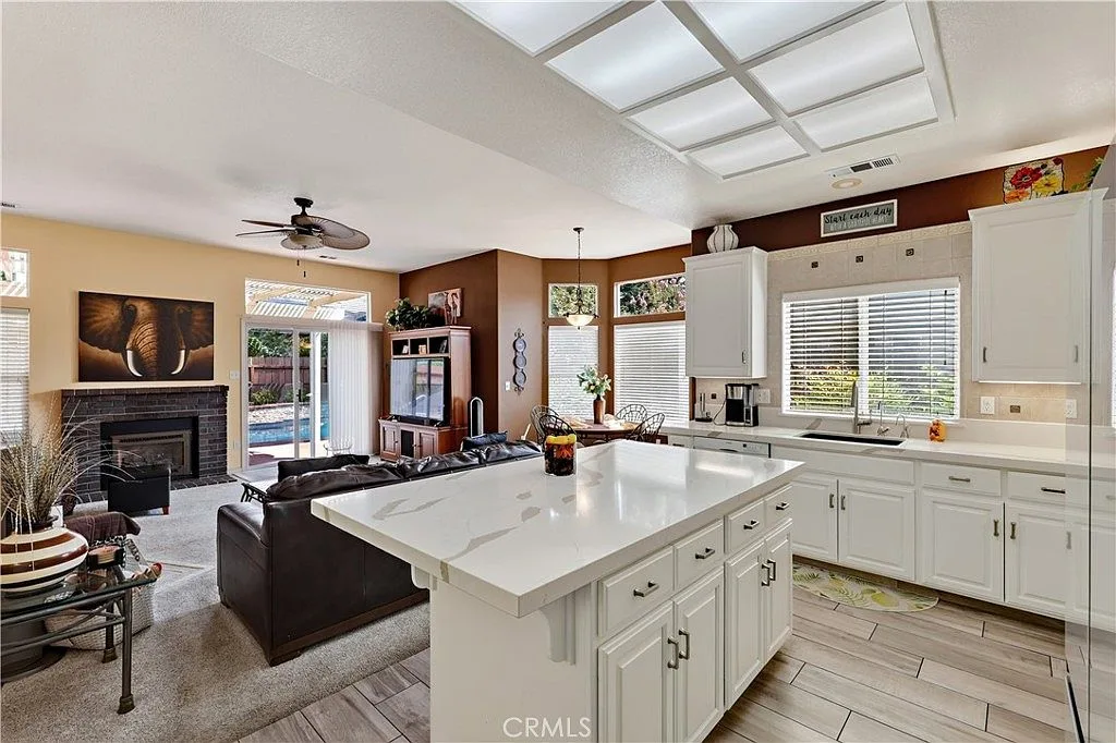 The kitchen flows straight into the family room