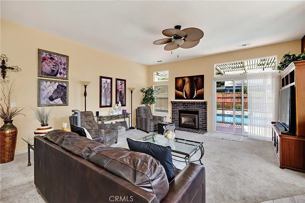 The family room, with gas fireplace and backyard view