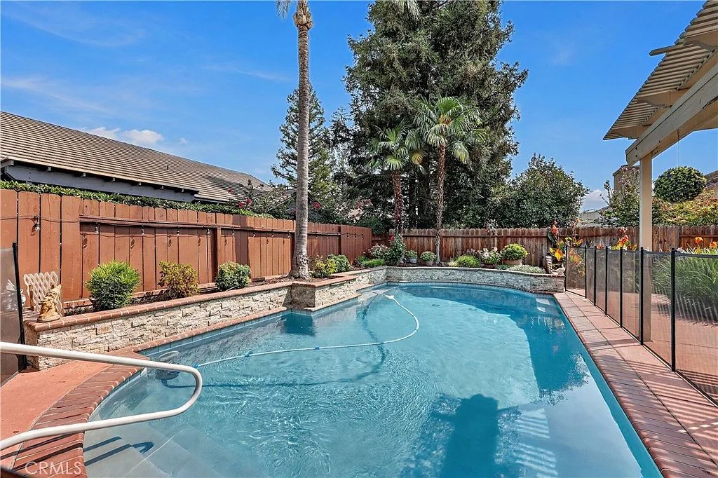 Heated pool with waterfall