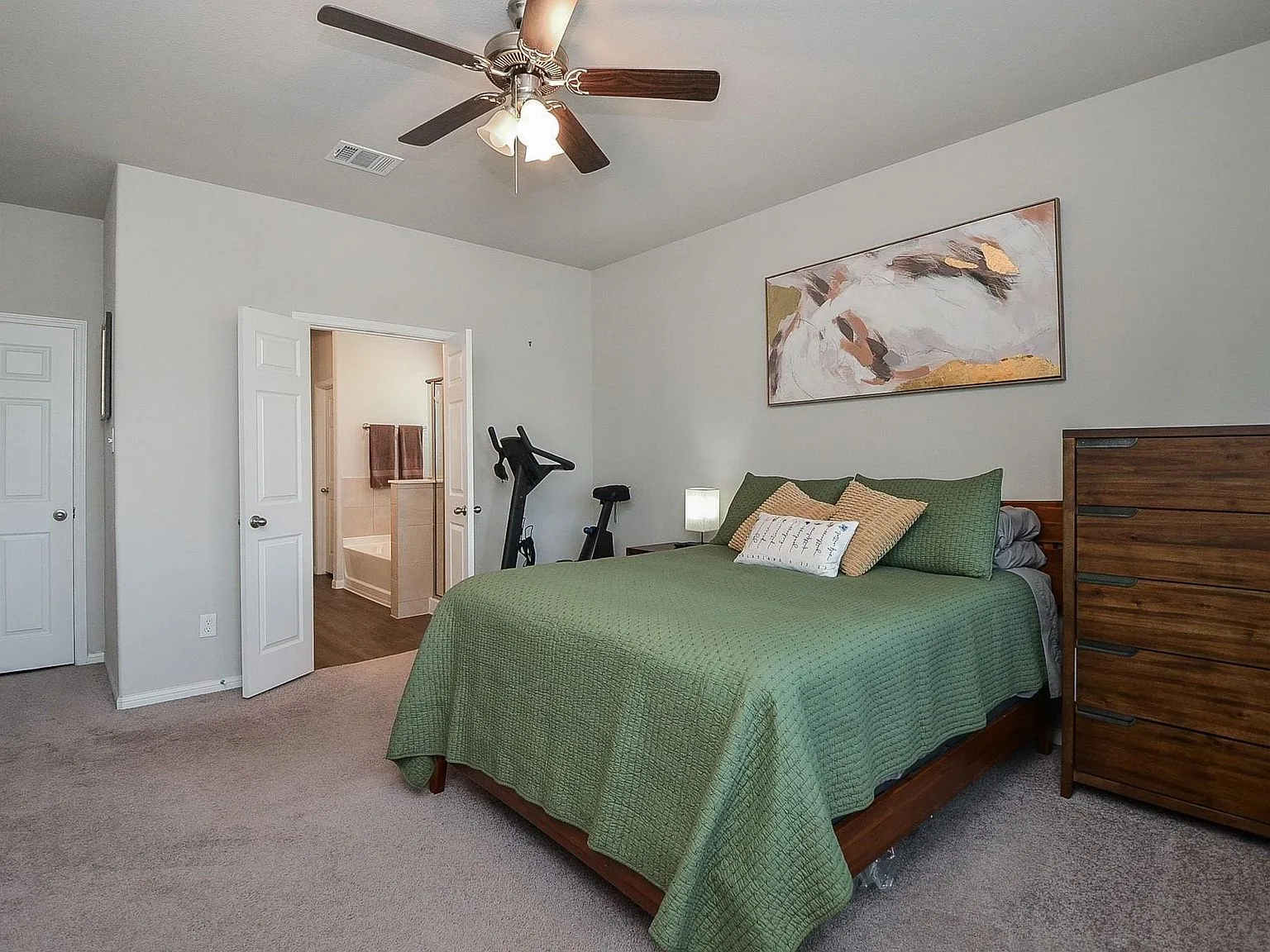 Primary bedroom with neutral tones