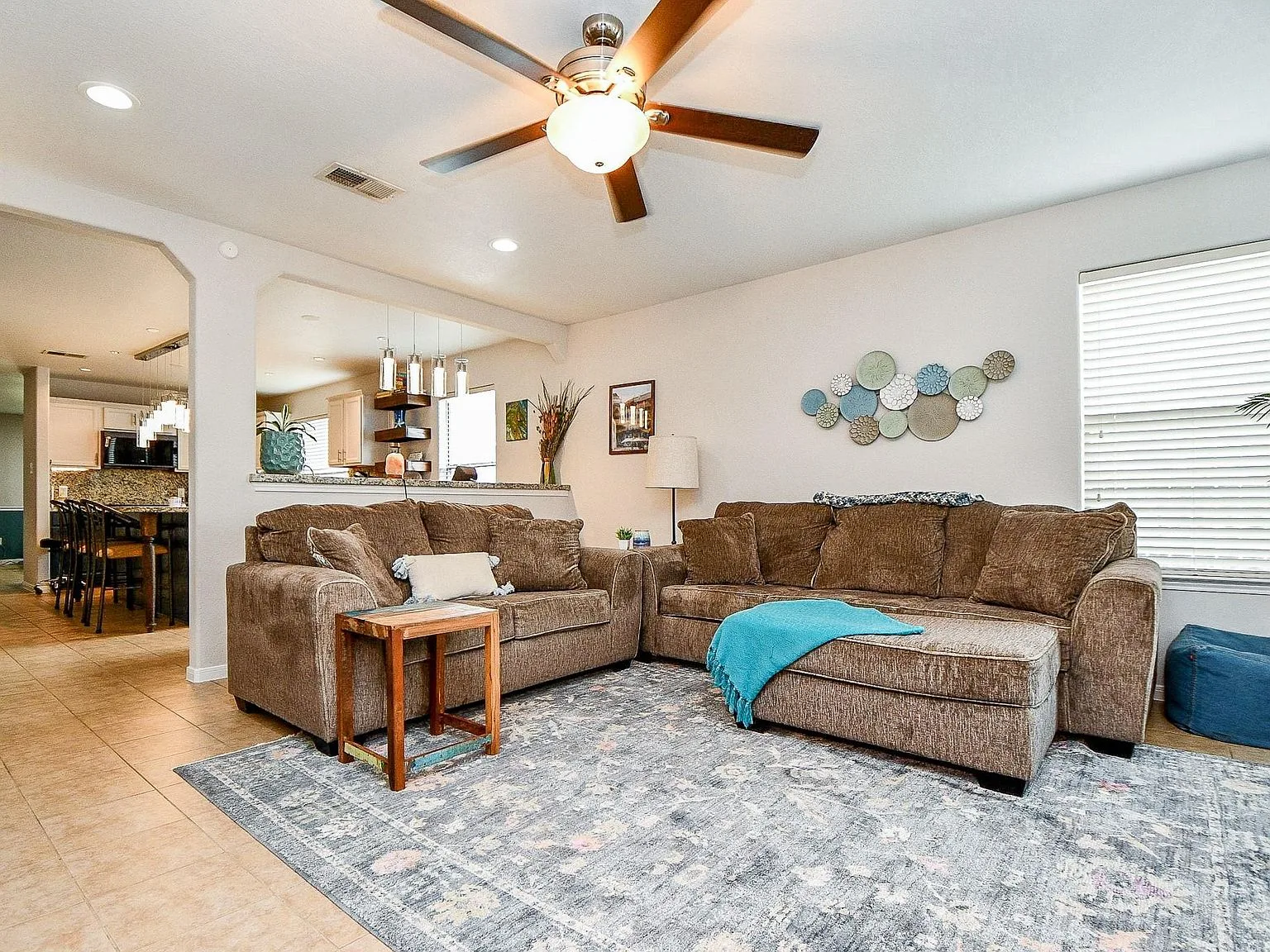 Open-concept living room looking toward the kitchen