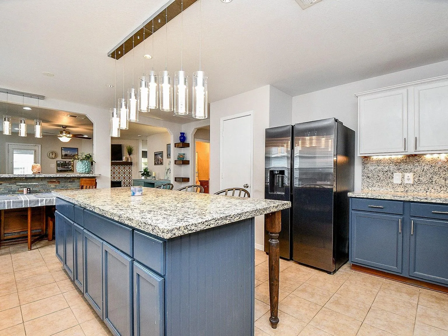 Kitchen island with slate blue lower cabinets