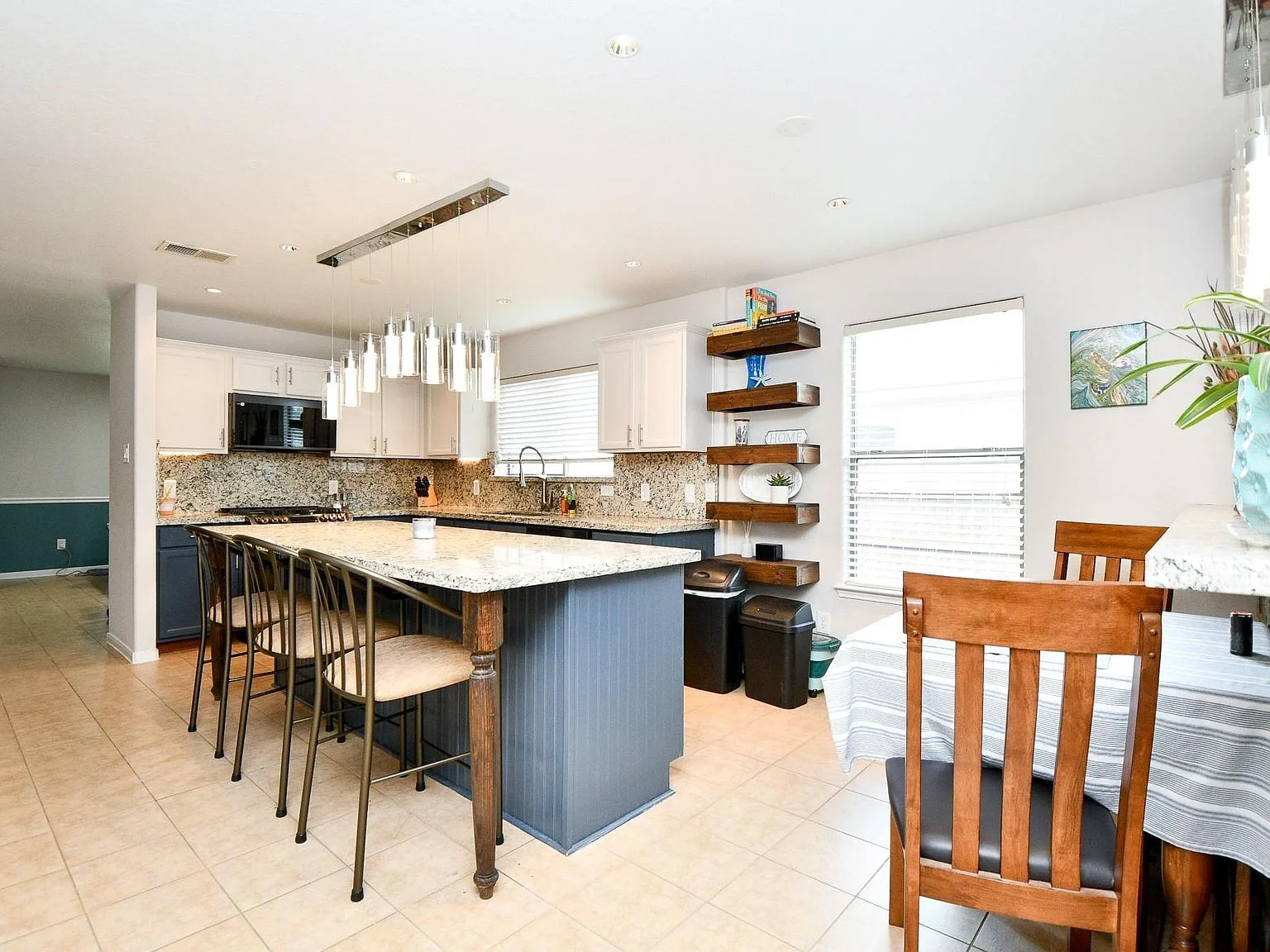 Two-tone kitchen with open shelving