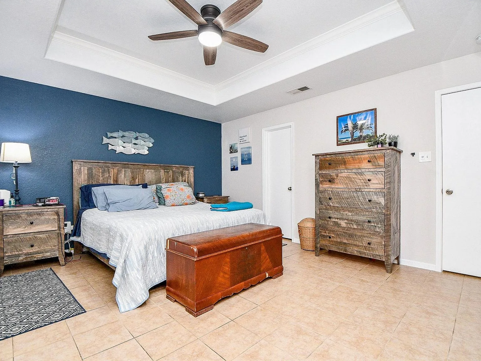 Primary bedroom with tray ceiling