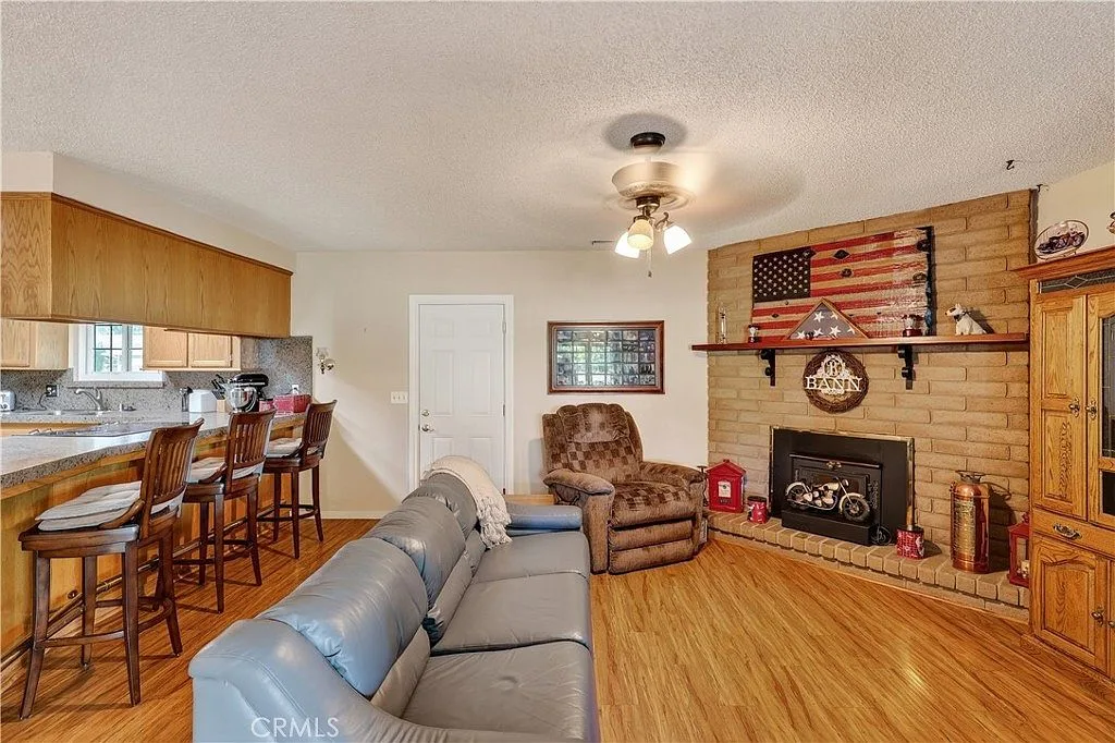 Family room fireplace with exposed brick