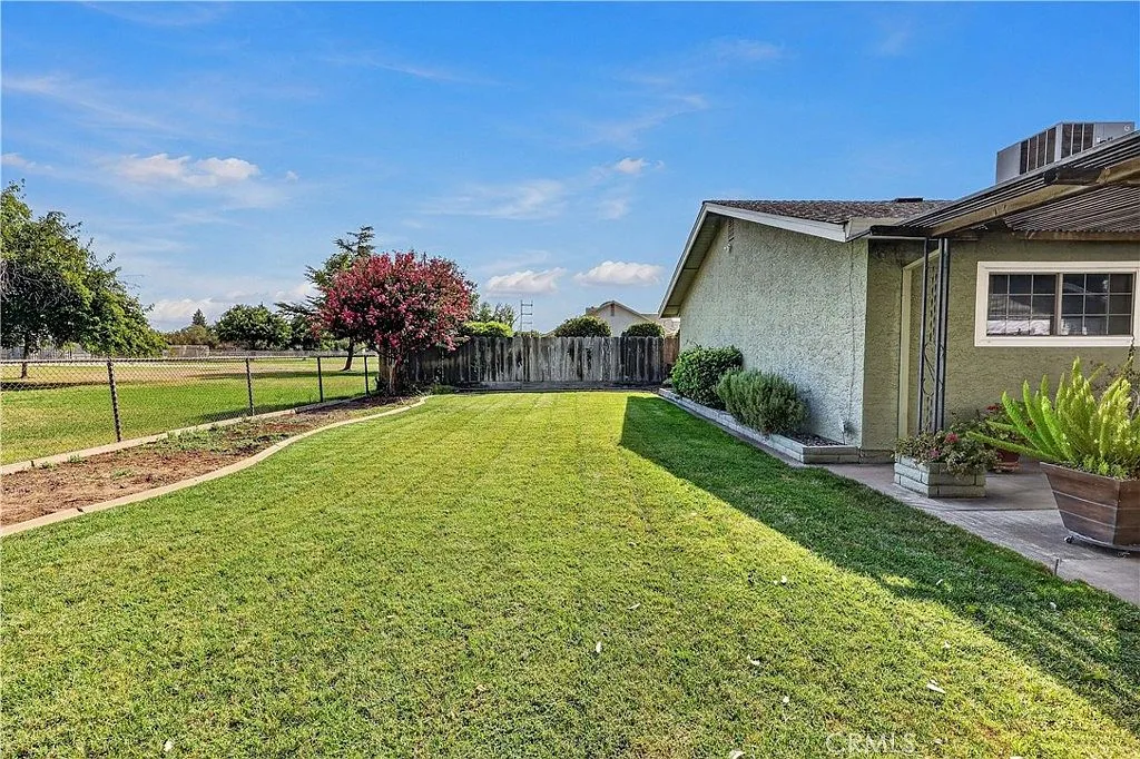 Parklike open space beyond the yard