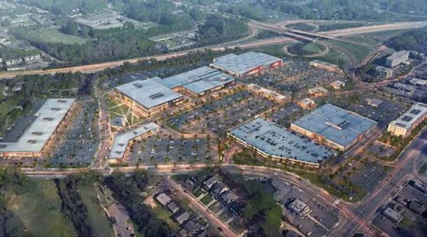 Aerial drone view of The Streets at Southpoint mall complex beside the highway interchange in South Durham