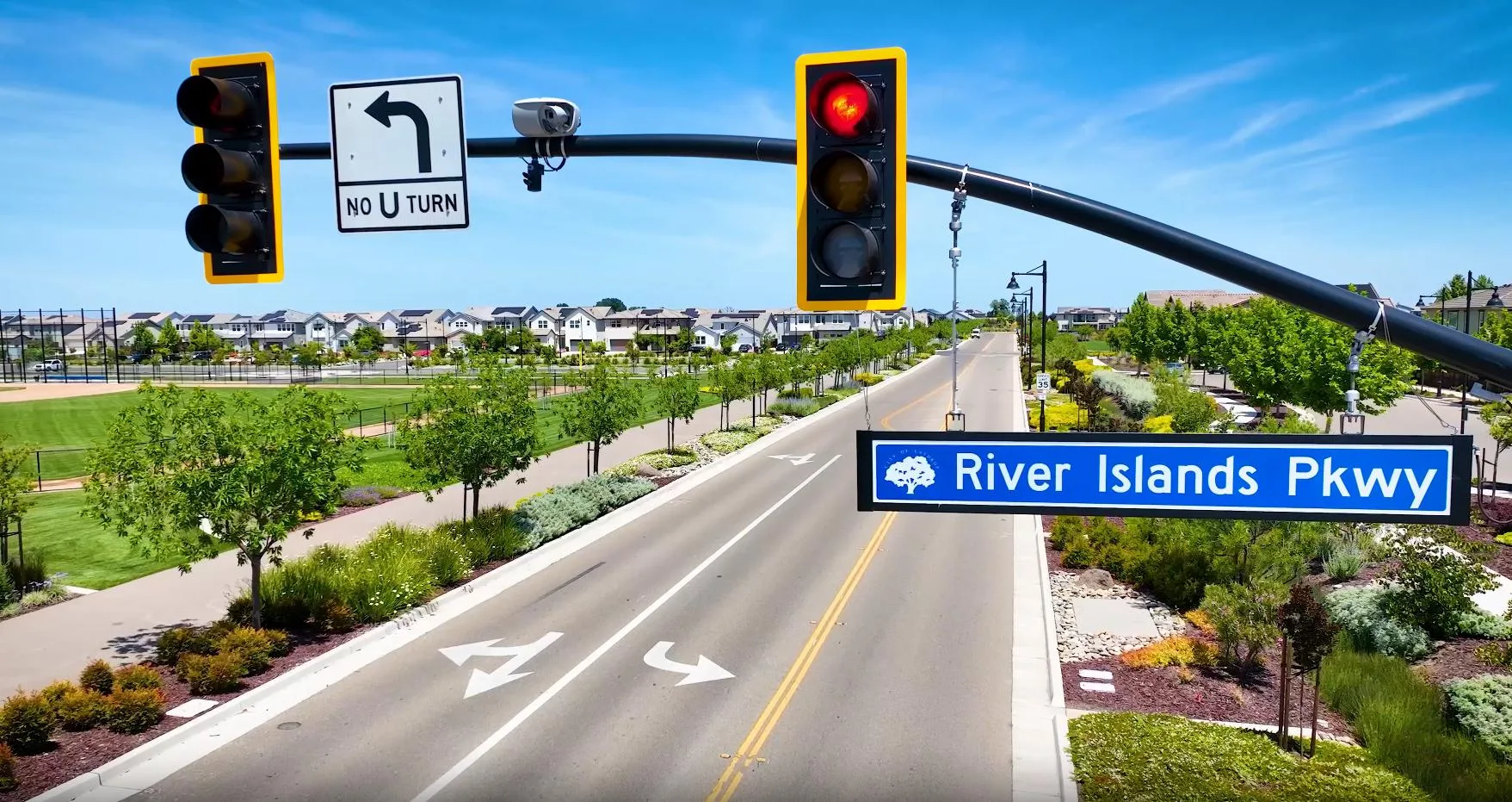 A River Islands Parkway street sign at an intersection in River Islands, Lathrop, California