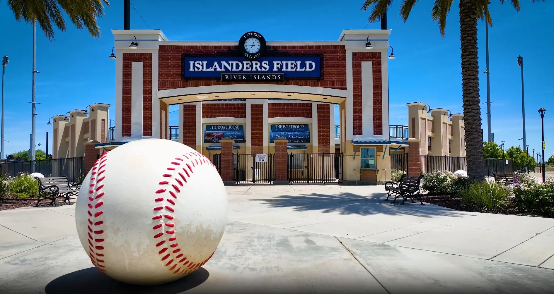 The Islanders Field entrance at River Islands in Lathrop, California, marked by a giant baseball sculpture