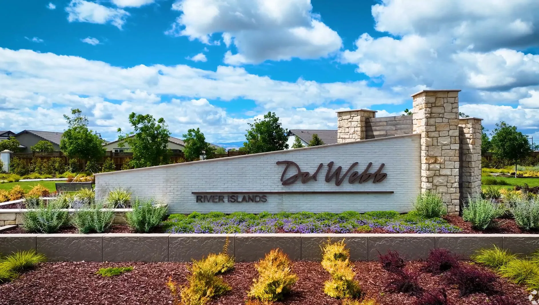 The Del Webb at River Islands entrance sign in Lathrop, California, marking the 55+ active-adult neighborhood