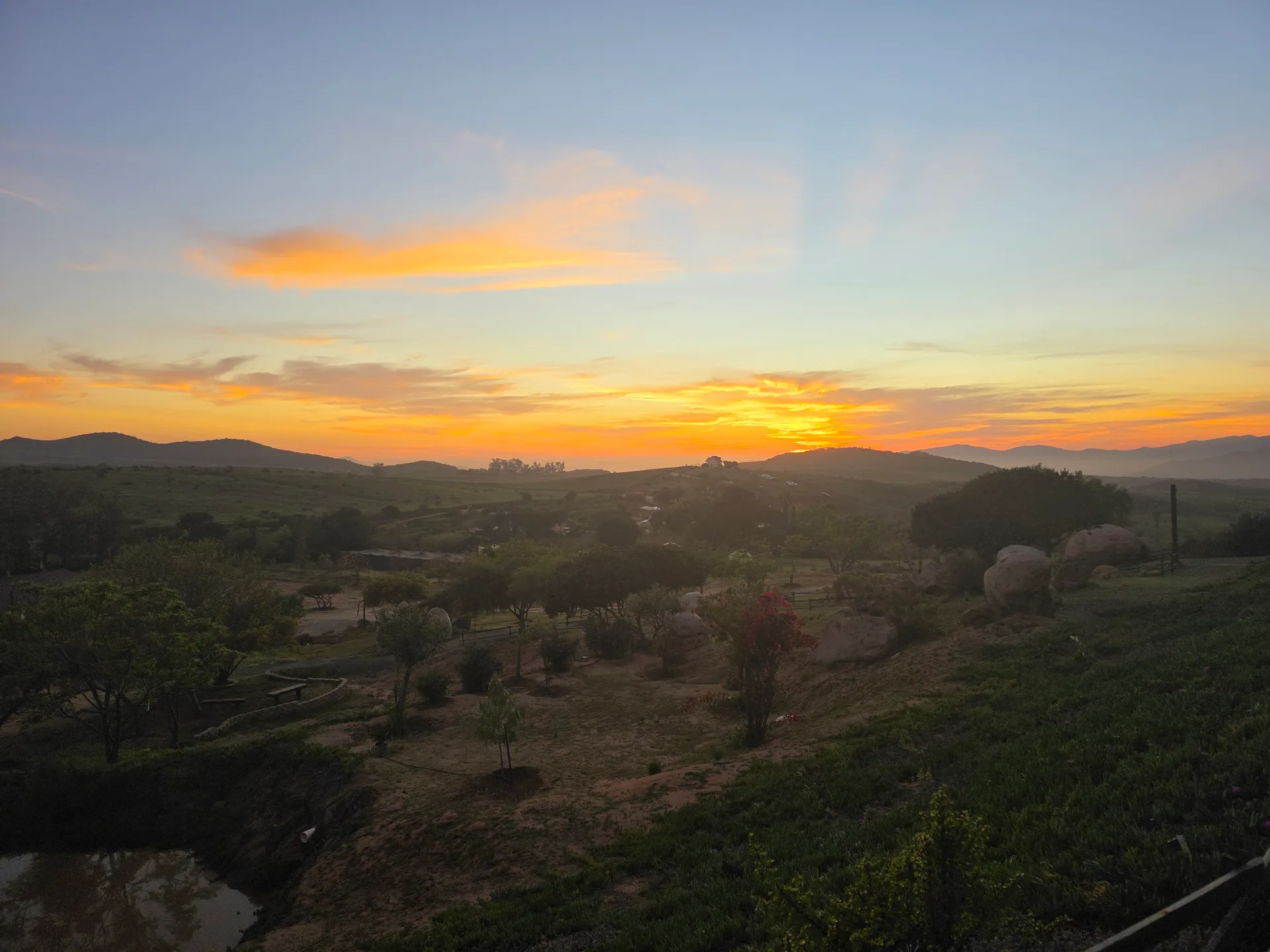 Golden sunset over the ranch hills near Ensenada