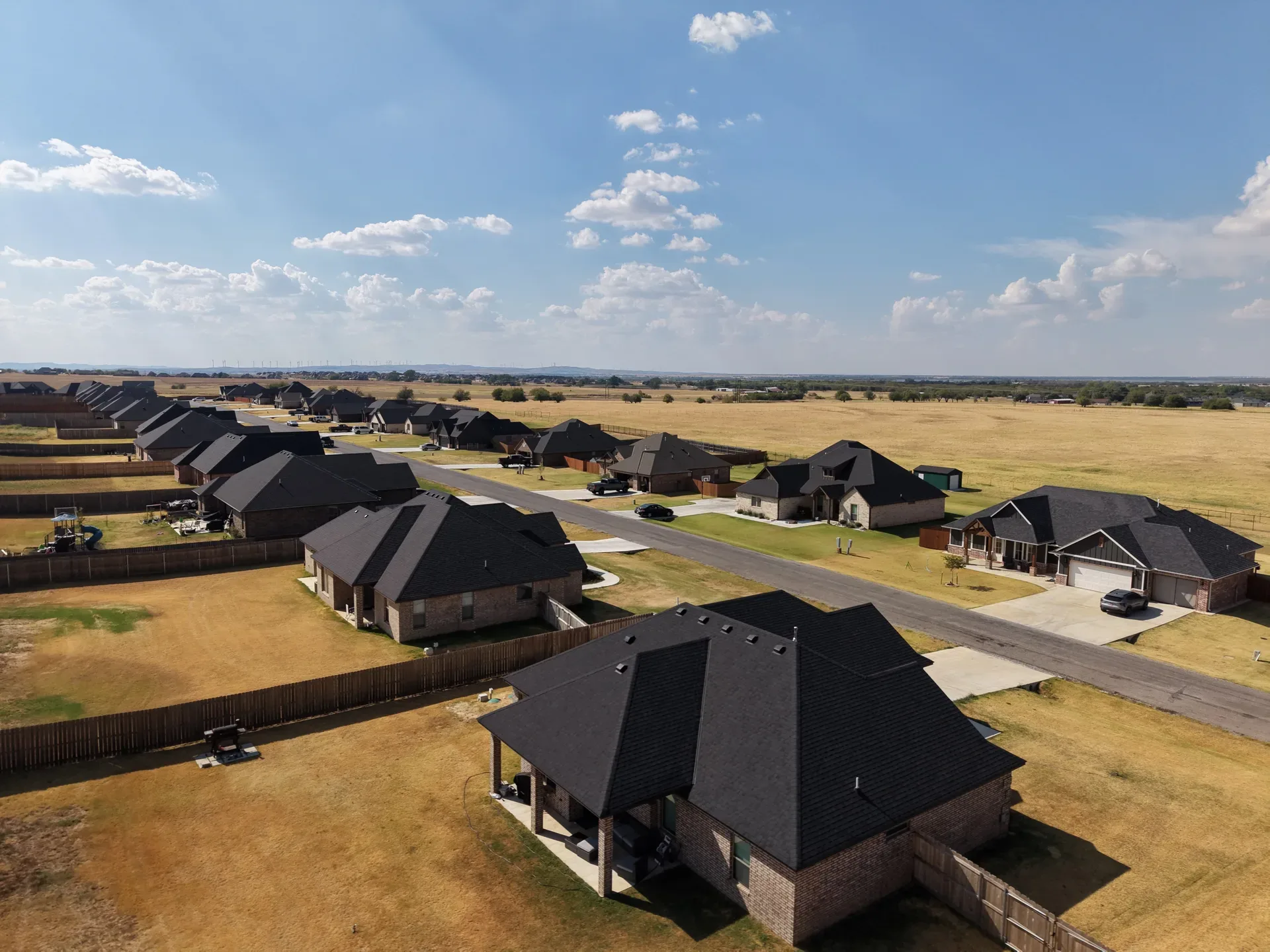 Aerial view of finished homes across Legacy Creek Estates in Elgin, Oklahoma