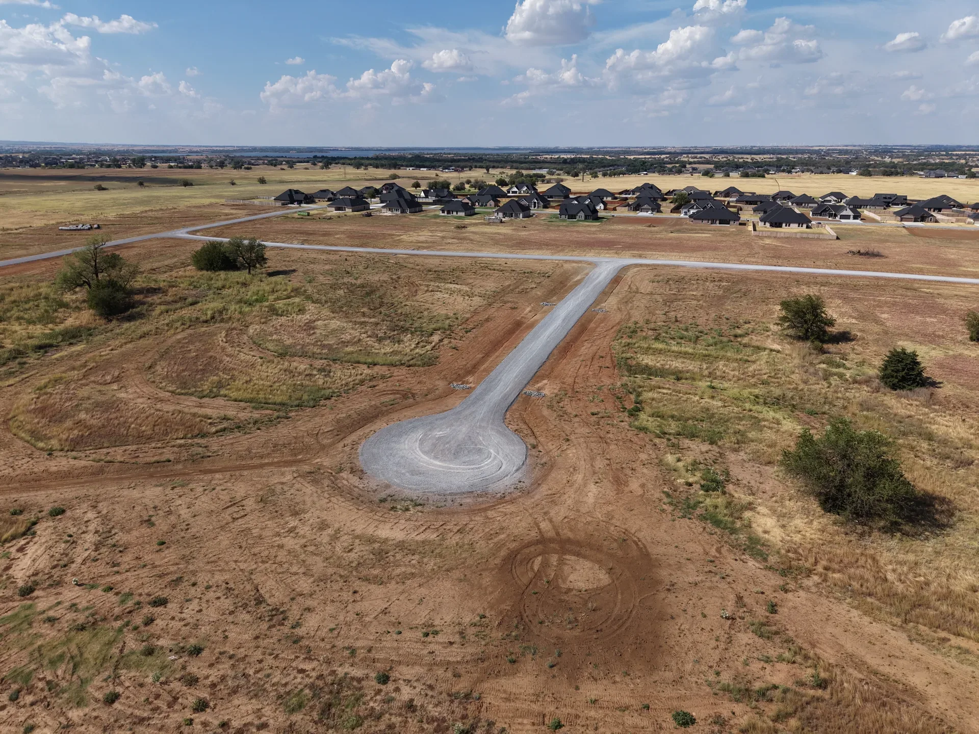 Cul-de-sac street with homesites taking shape at Legacy Creek Estates outside Elgin
