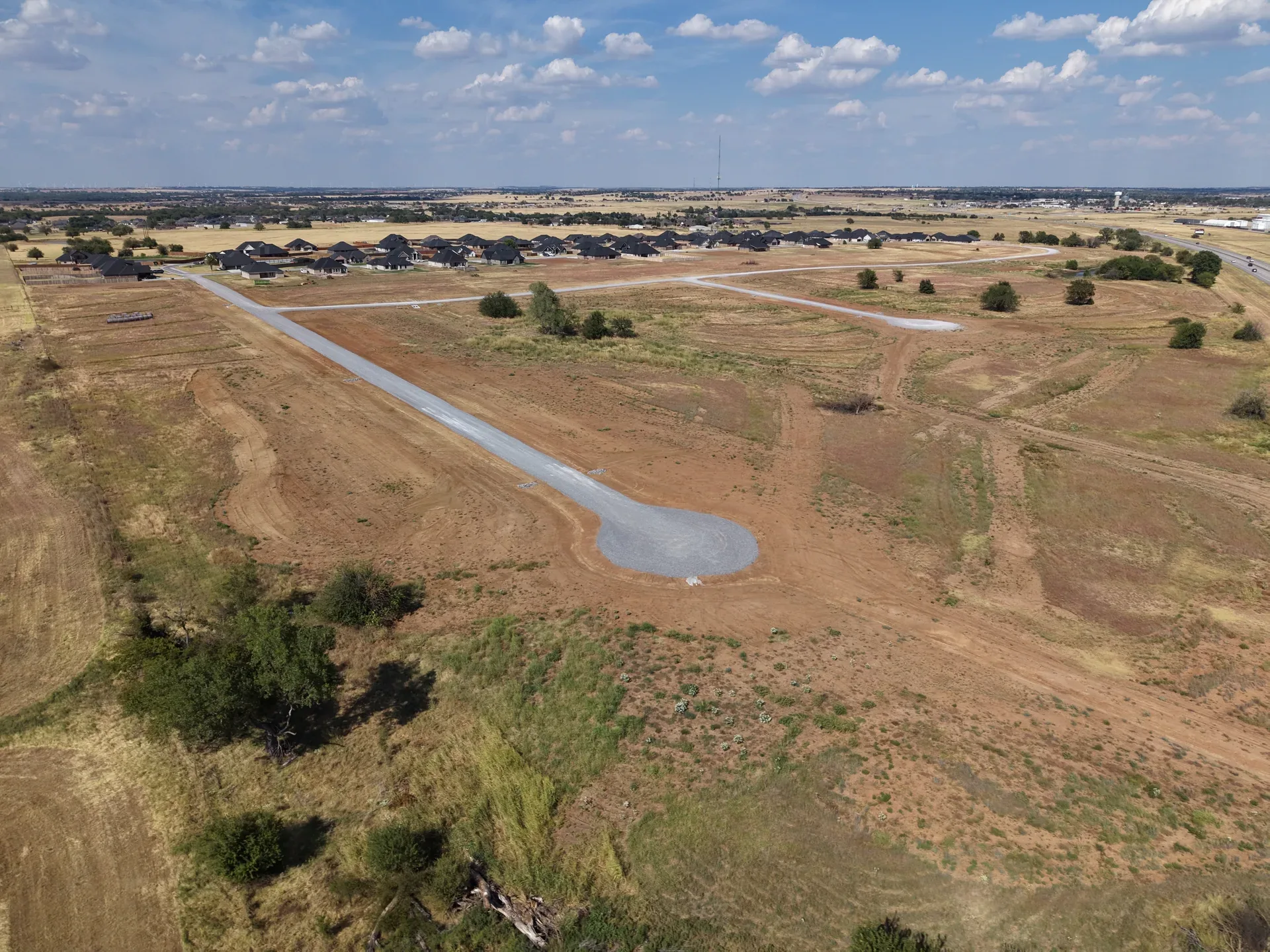 Cleared homesites along new roads at the edge of Legacy Creek Estates