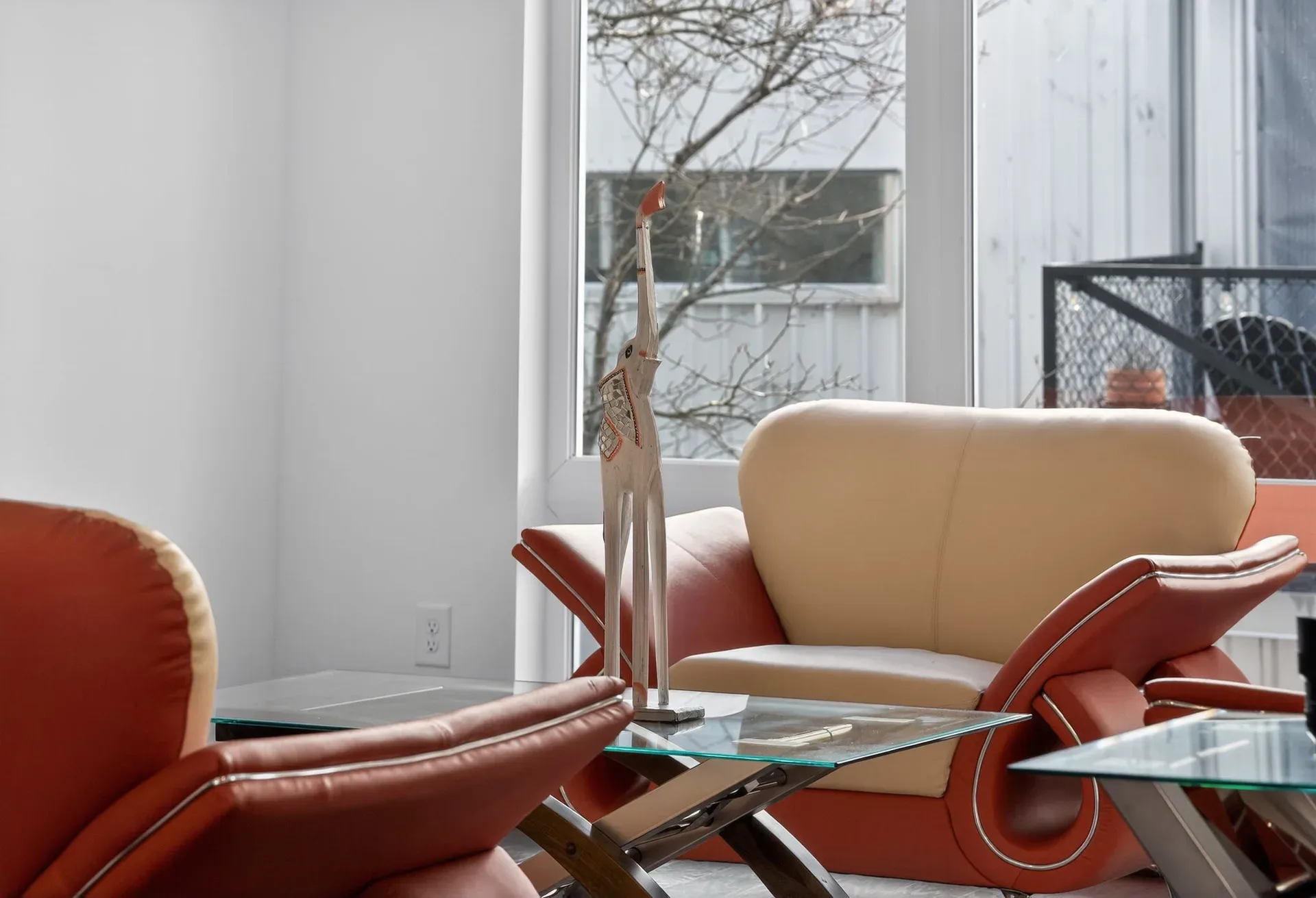 Living and dining, behind the glass at 241 Maynard Terrace